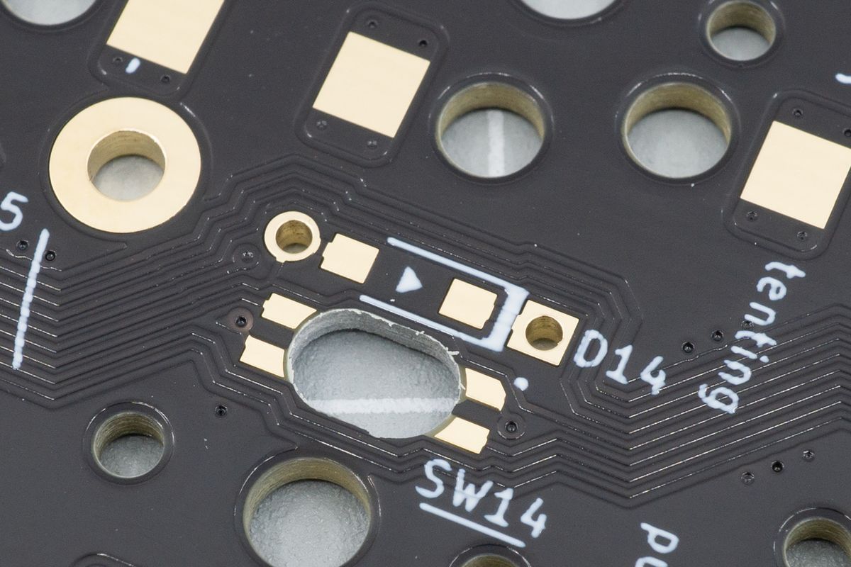 You'll solder them to this footprint, next to D14. The through hole diodes go through the holes, while the SMD diodes use the pads in the middle