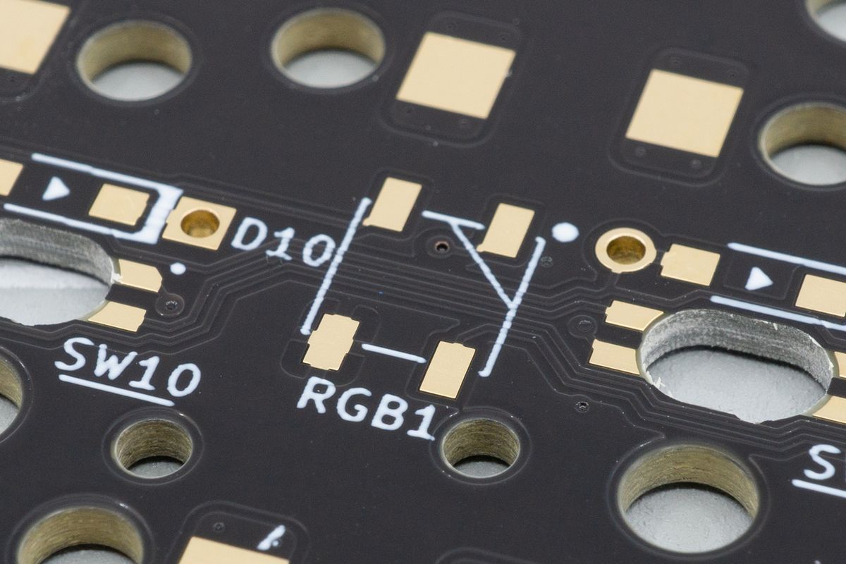 They get soldered to these footprints, labelled with "RGB". Our kits have larger pads than usual, making them easier to solder for beginners