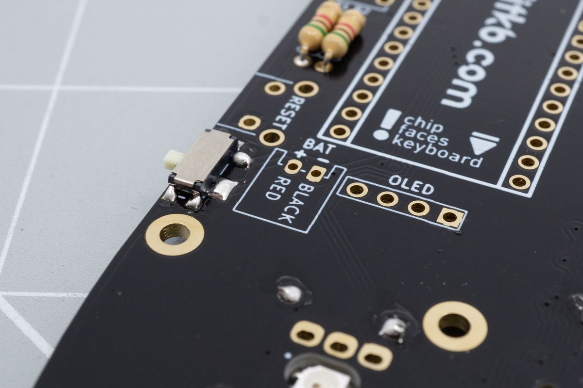 The battery footprint. The white rectangular outline shows it's compatible with the JST jack. If there's no rectangle, then you should skip this section and manually connect the battery in a later step