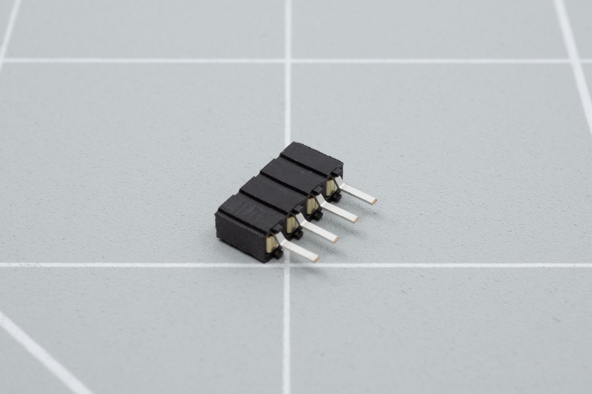 The bottom side of a 4-pin socket