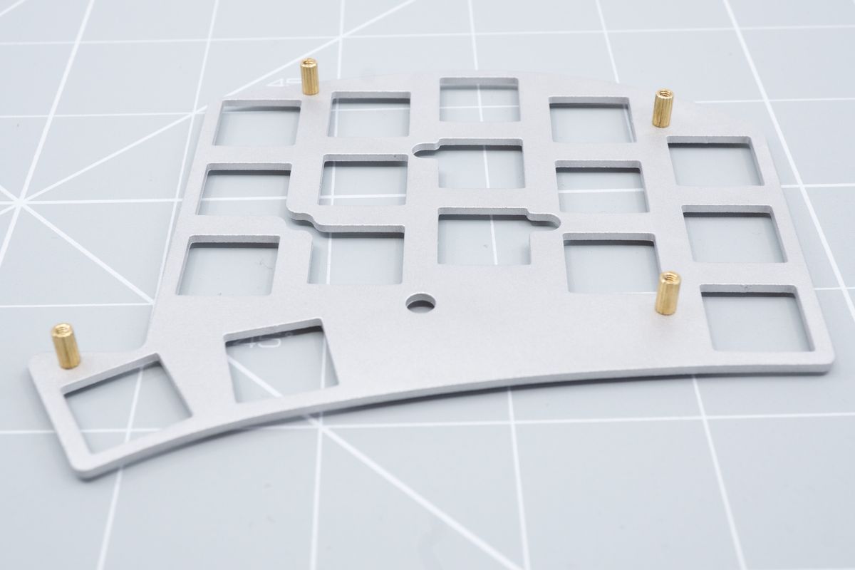 Installing 6mm spacers onto the plate for use with Kailh Choc low profile switches. When using MX switches, use 8mm spacers instead