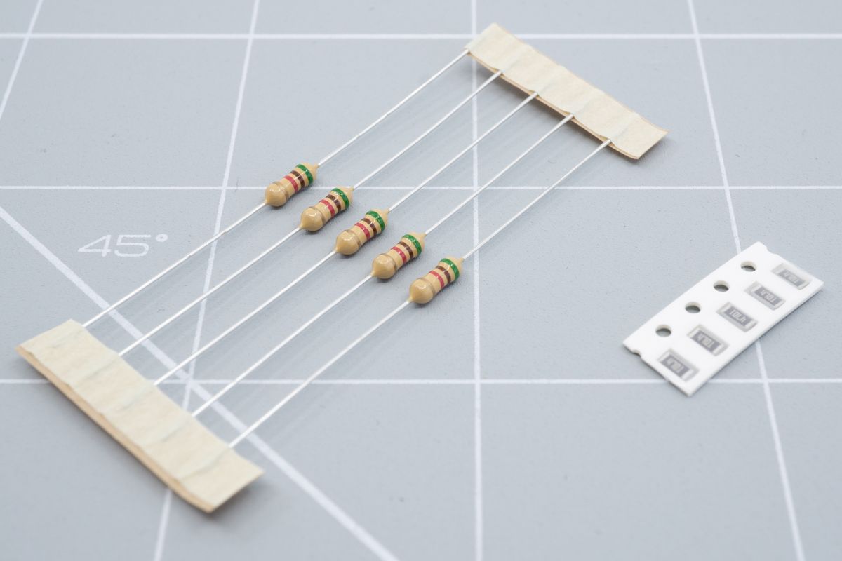 Through hole resistors on the left, and SMD resistors on the right