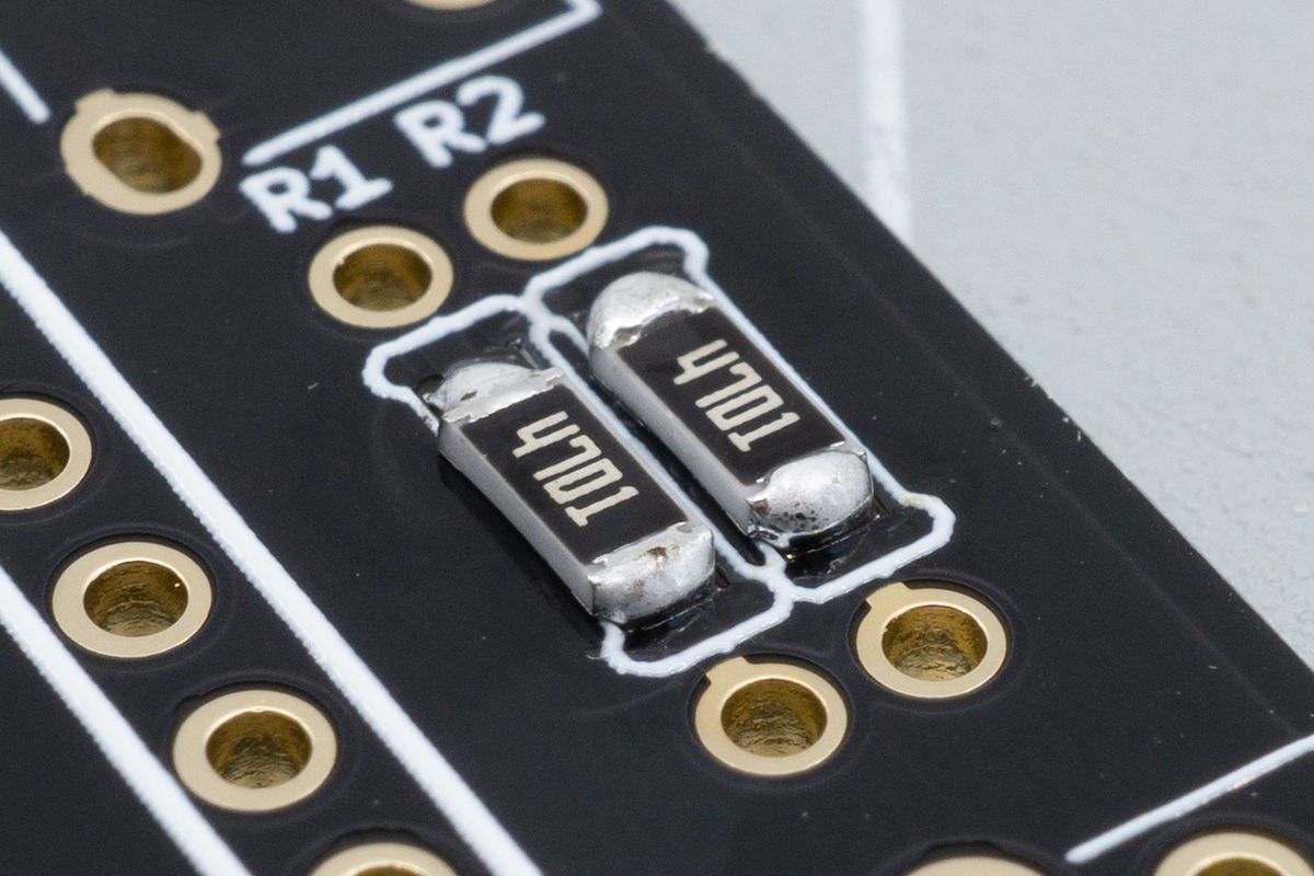 Both SMD resistors soldered