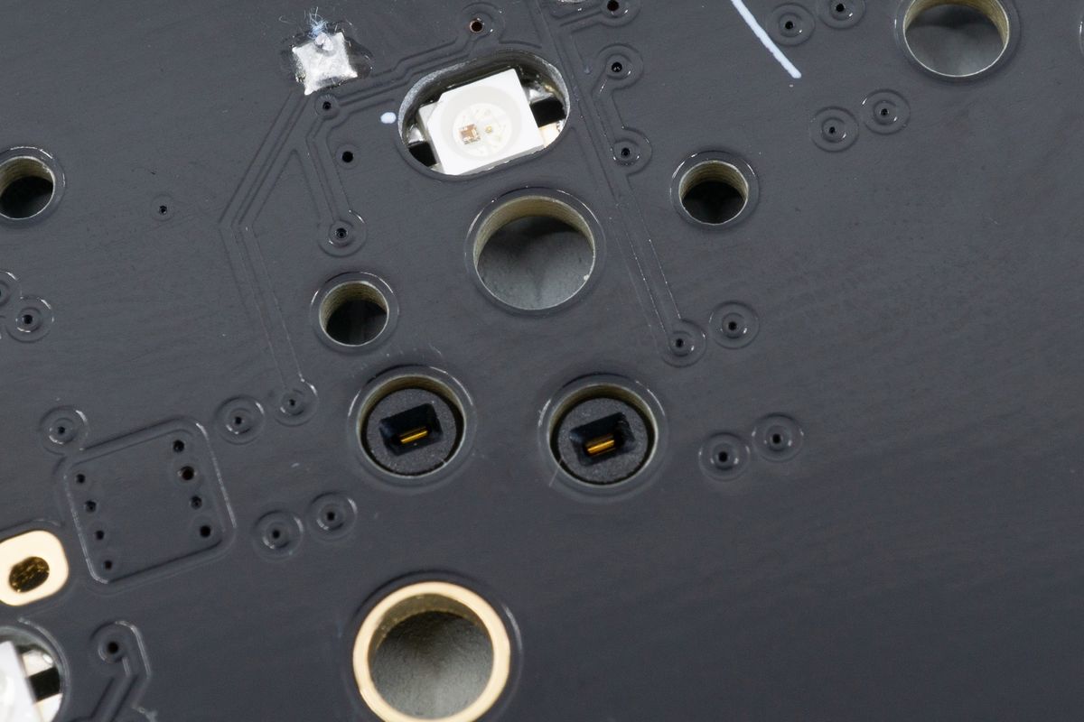 Looking at the socket from the top side of the PCB, you'll see the contacts where the switch pins will connect