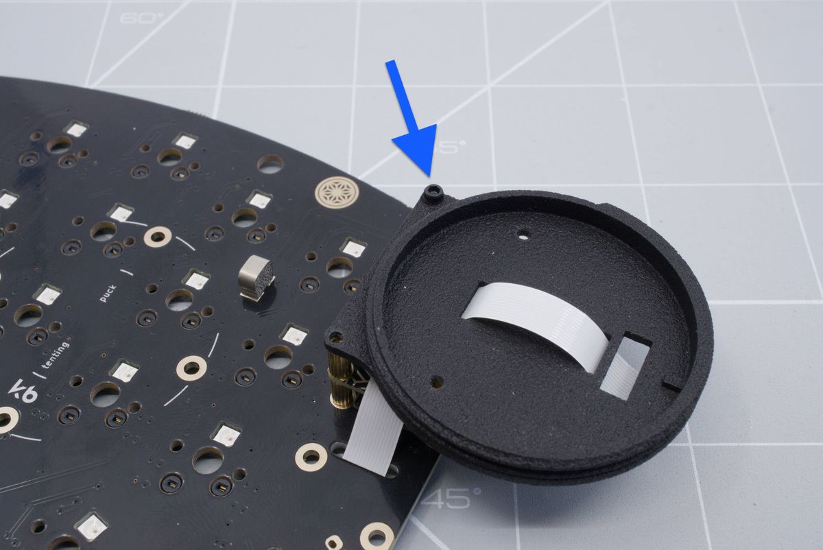 Screwing in the top screw