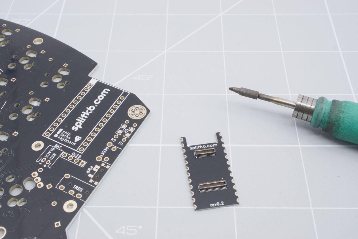 The connector board, keyboard PCB and soldering iron