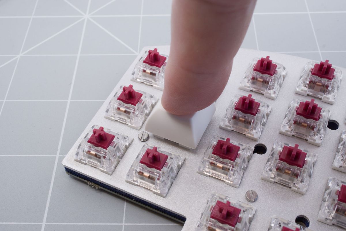 Pressing on the keycaps