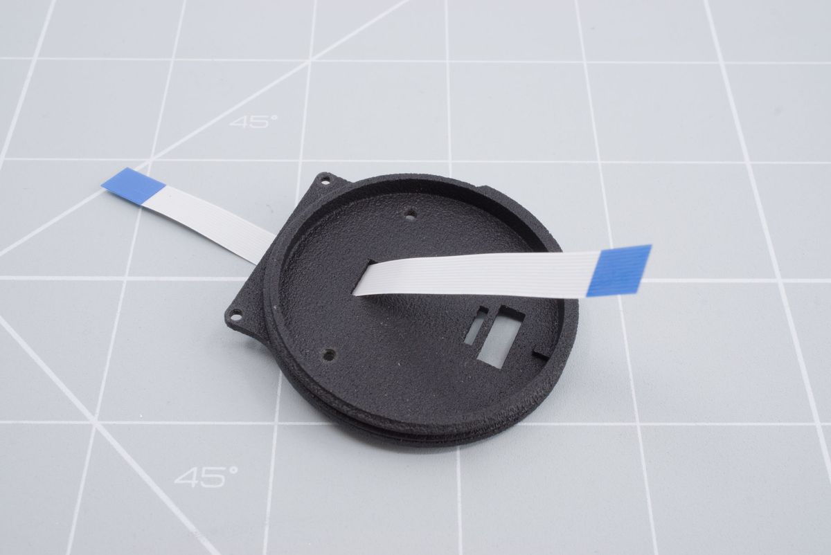 Threading the cable through the first hole