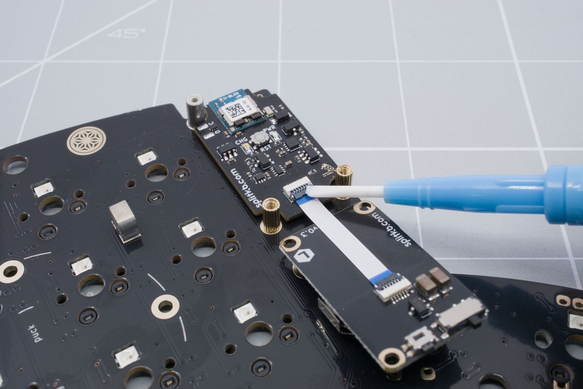 Lowering down the battery connector tab