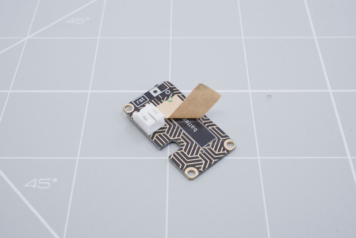 Removing the film of the double-sided tape
