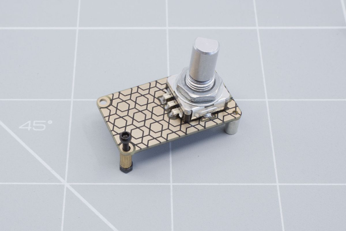 Installing the screw, spacer and nut