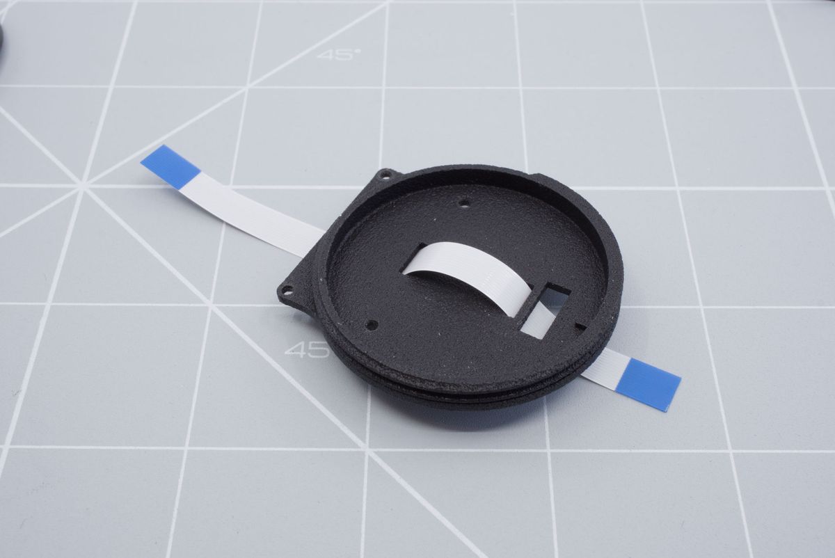Threading the cable through the second hole